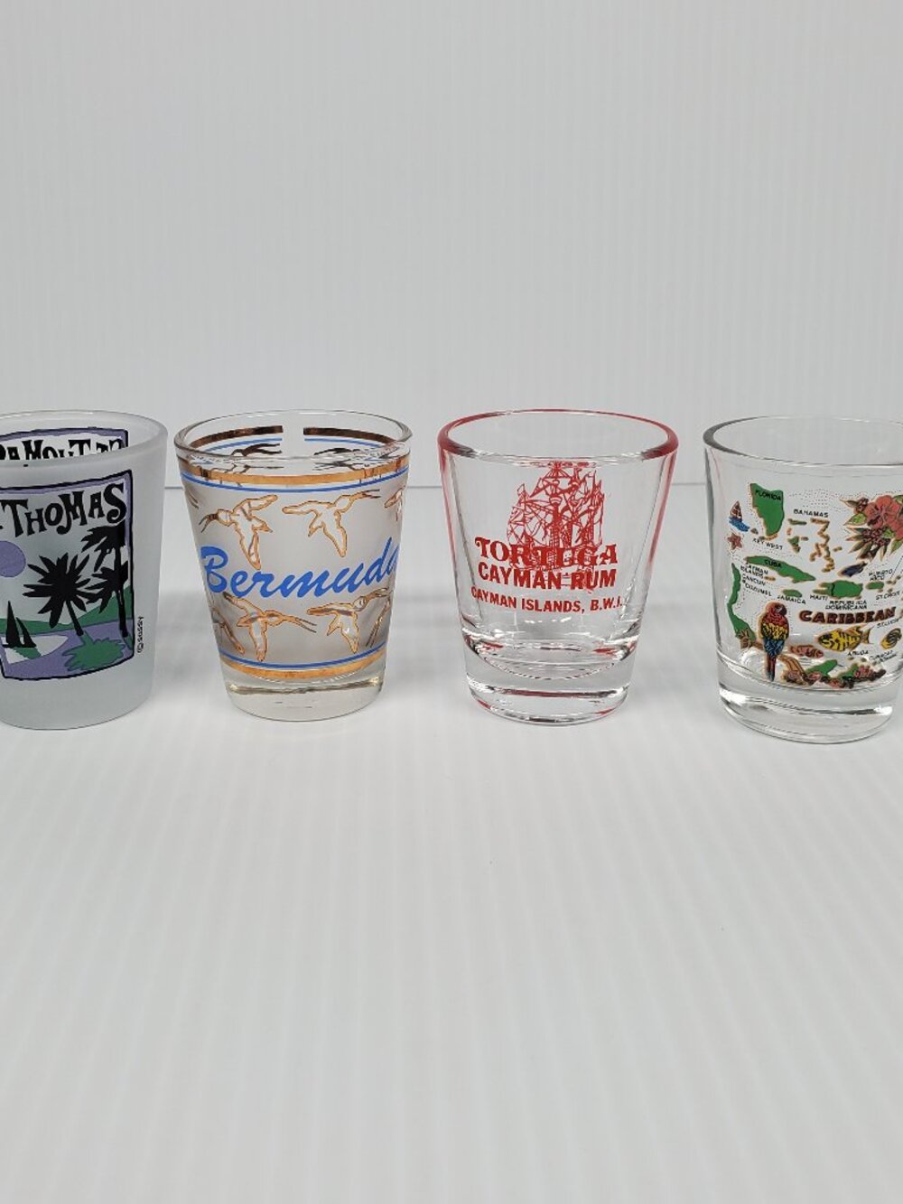 Set of 4 Shot Glasses from Caribbean Trip, St. Thomas-Bermuda-Caymon-Caribbean